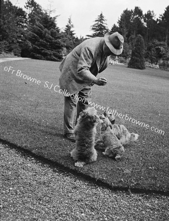 GENT WITH STANDING PUP